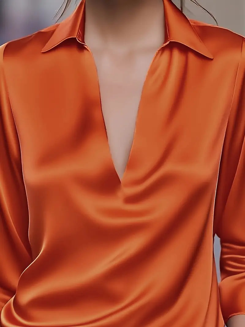 Blusa de mujer: manga larga, cuello camisero y escote en V