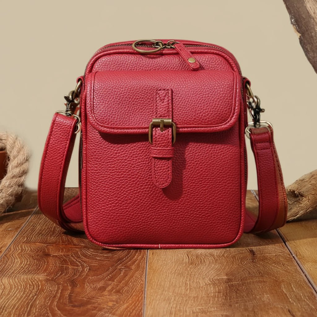 Dámská kompaktní kožená crossbody kabelka se zamykatelnými zipy