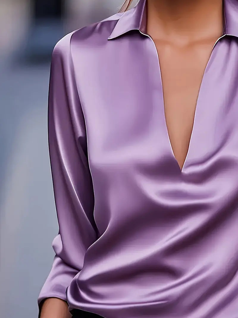 Blusa de mujer: manga larga, cuello camisero y escote en V
