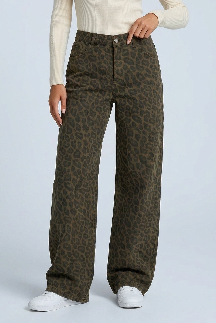 Front detail of the denim waistband, belt loops and slant pockets