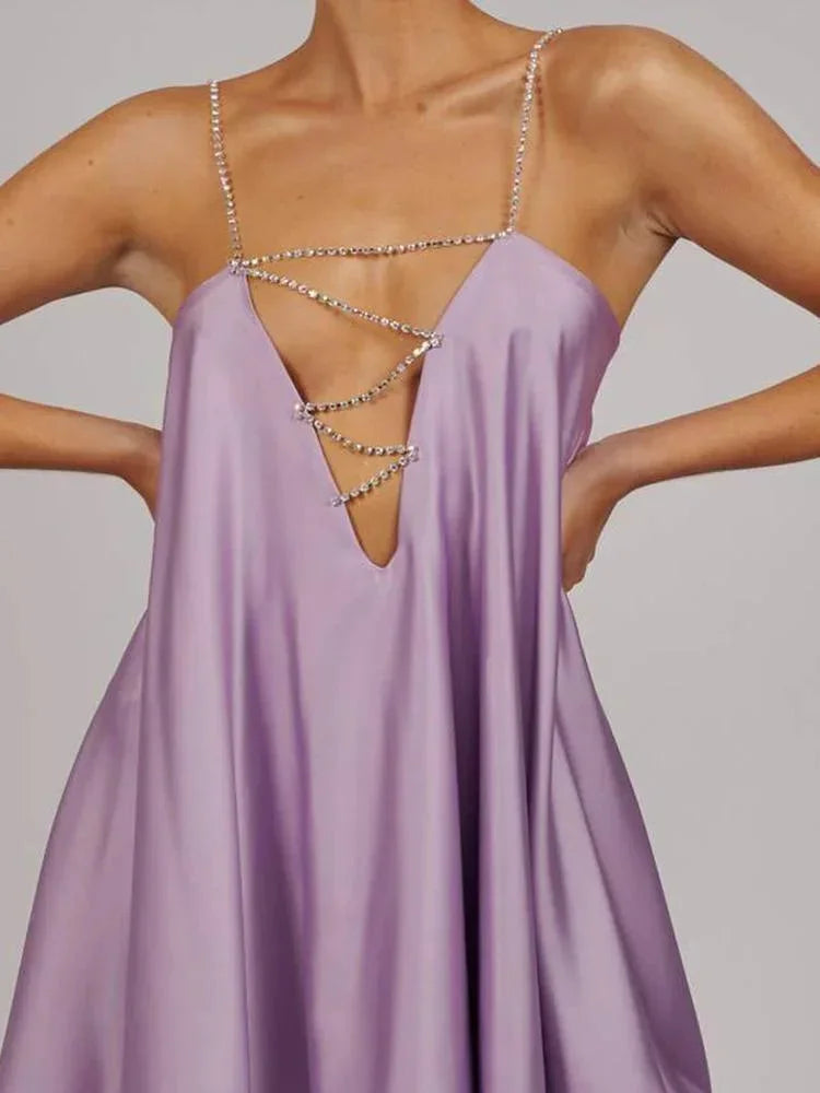 Lyra - Mini abito da sera con dettaglio catena da donna
