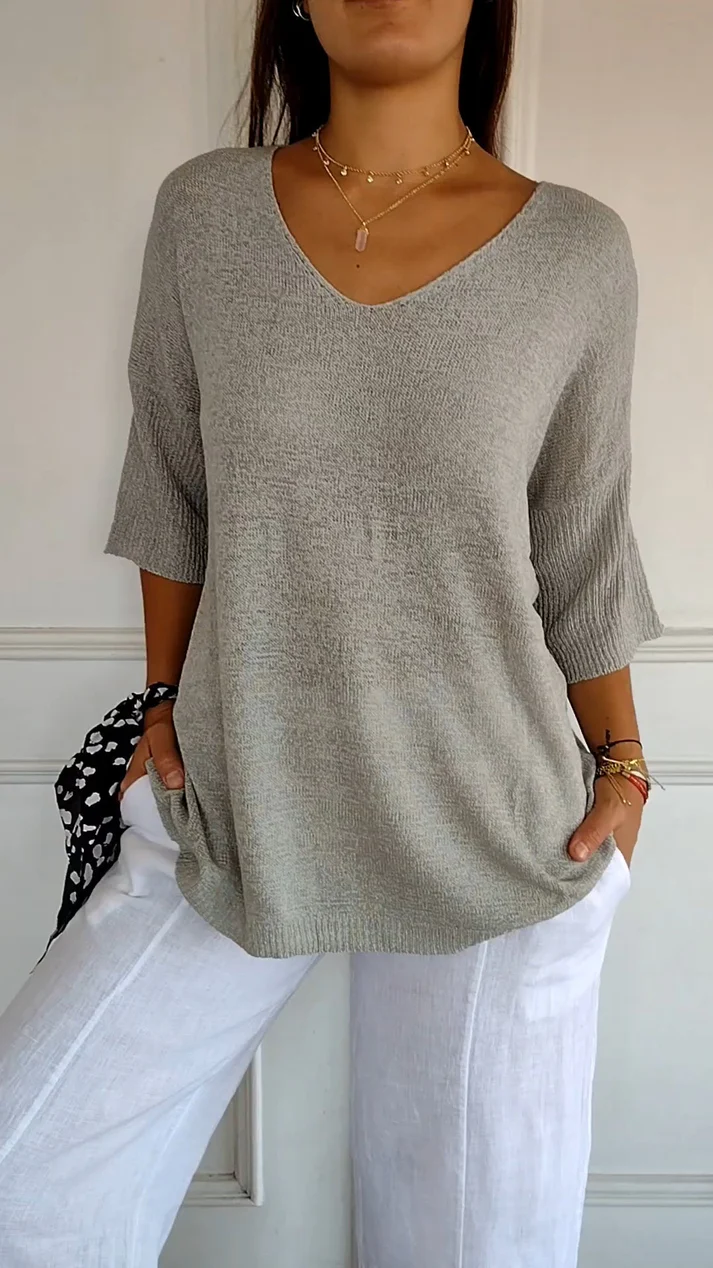 Blouse femme à col en V, manches 3/4 et ourlet arrondi