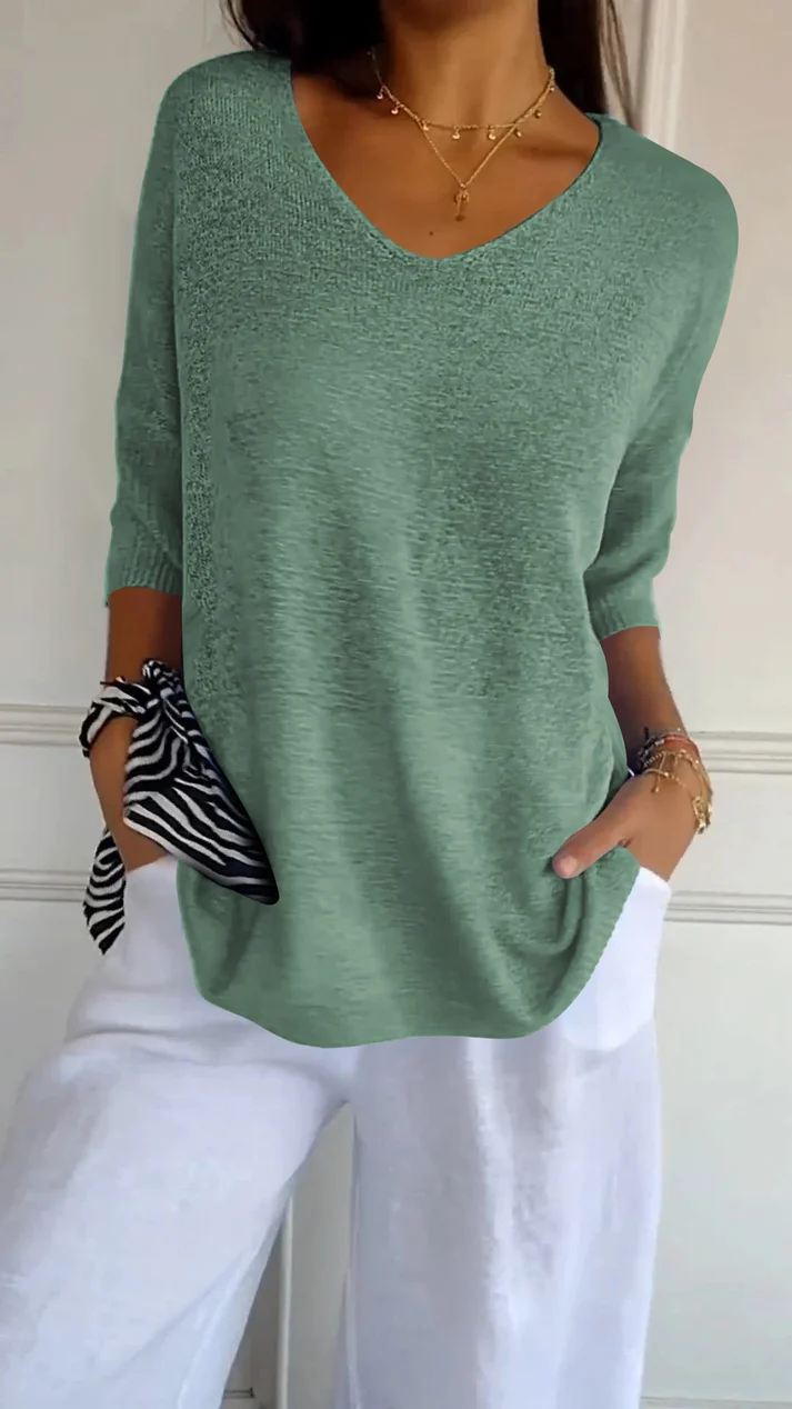 Blouse femme à col en V, manches 3/4 et ourlet arrondi