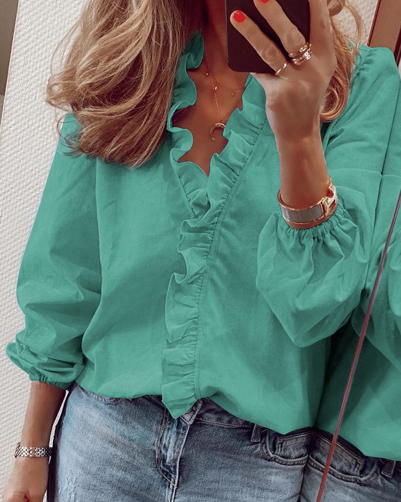 Blusa de mujer con escote en V, volantes y mangas fruncidas
