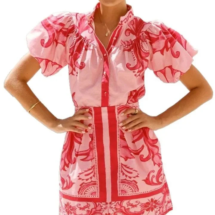 Miniabito estivo da donna con maniche a palloncino e motivo floreale