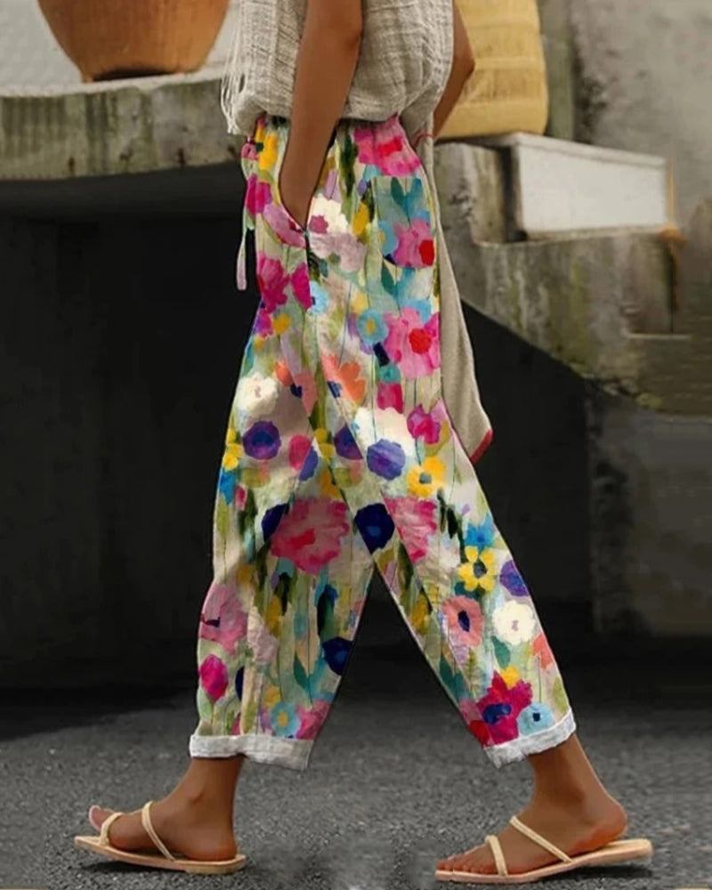 Carrie - Women's Flowing Trousers in a Vibrant Floral Print